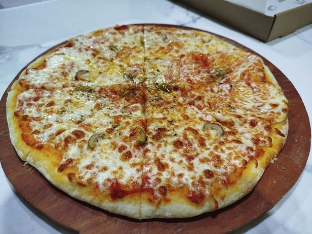 Pizza Mozzarella de Café Roga